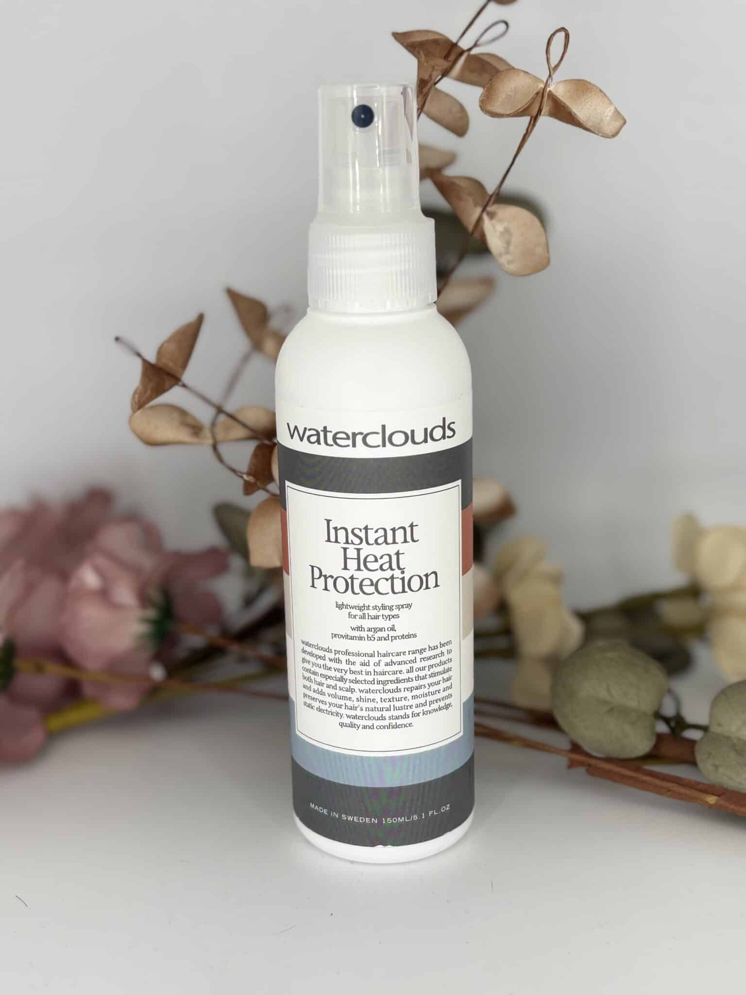 Varmebeskyttende spray fra Waterclouds – beskytter håret mod varme, tilfører glans og fugt. Ideel til hair extensions.